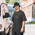 BECOME. Oversized Faded Tee in Faded Black, front view with BECOME. printed across the chest